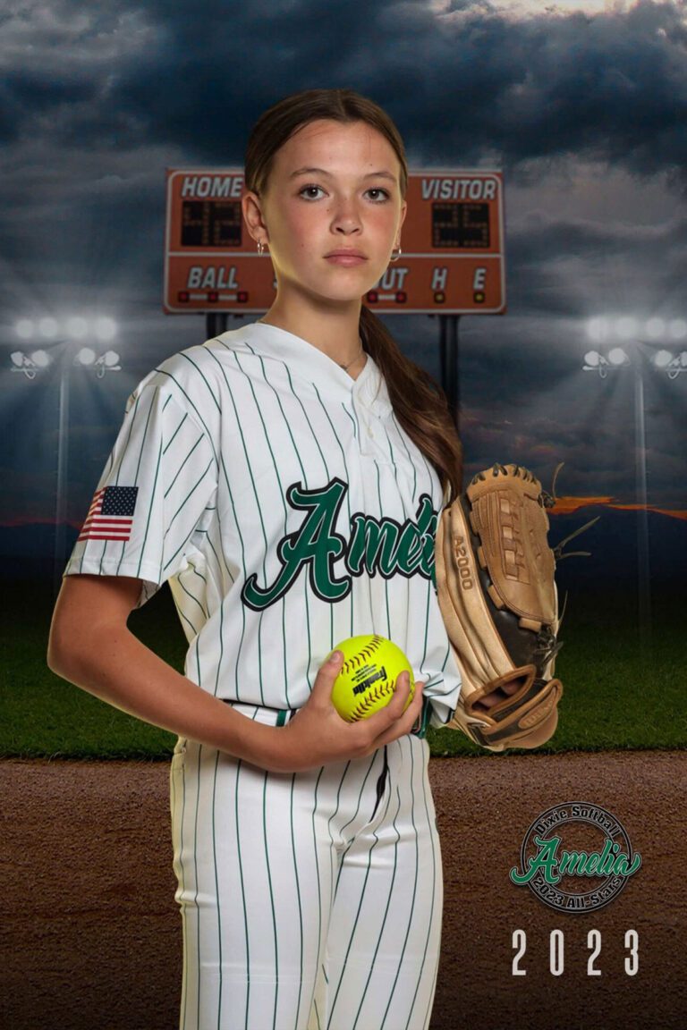 A girl posing for a volume sports photography team picture.