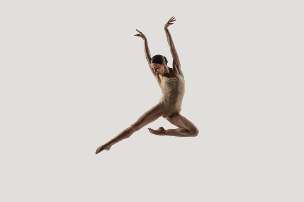 Modern ballet dancer. Contemporary art ballet. Studio shot isolated on white background.
